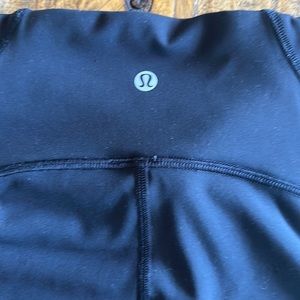 Lululemon BLK 8 3/4 leggings with mesh panel on side of each leg